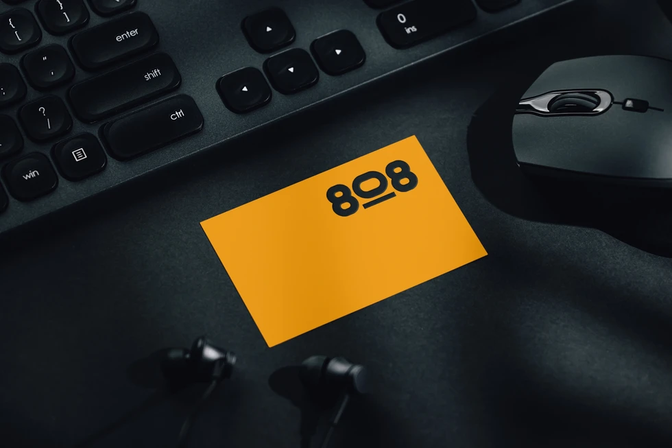 a yellow card with the number 808 on it