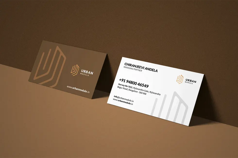 a brown and white business card for urban module