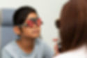 asian-kid-with-caucasian-optometrist-woman-examining-eyesight-closely-consultation.jpg