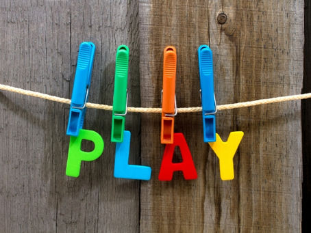 letters spelling PLAY for a play café concept