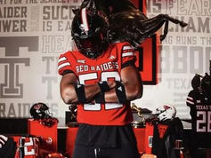 Felix Ojo in a Texas Tech uniform after signing a $5.1 million deal to play for the school.