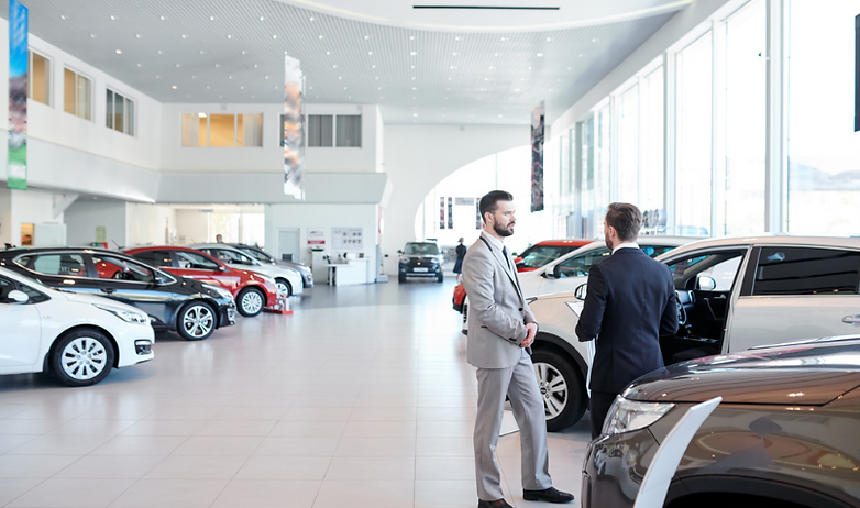 men at car dealership - f&i.PNG
