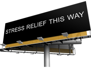 Black billboard on a pole has white text saying "STRESS RELIEF THIS WAY."