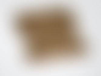 Wooden letter tiles set on a white surface spell "Life Will Not Wait"  