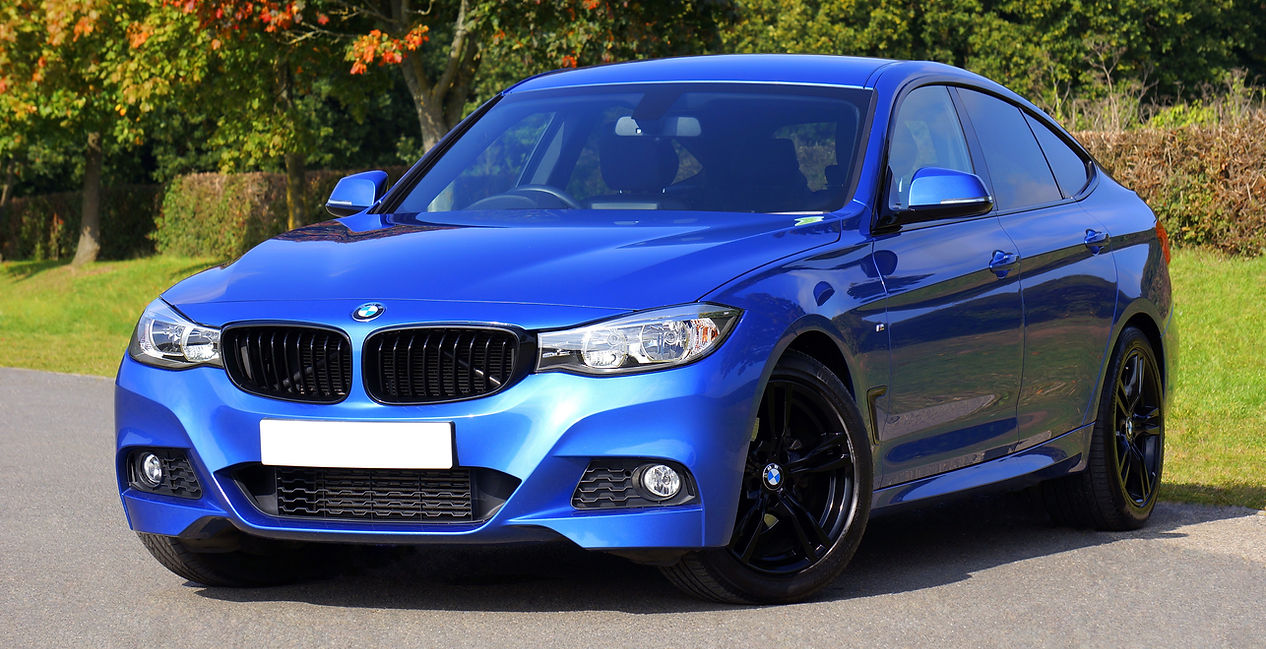 Close-up shot of a sleek car window with professionally installed tint film, highlighting enhanced privacy, reduced glare, and protection from harmful UV rays, offering a comfortable driving experience