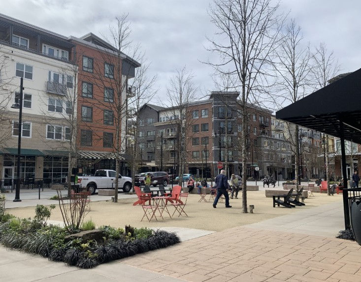 Pressure Wash cleaning storefront sidewalk and entryway Bothell