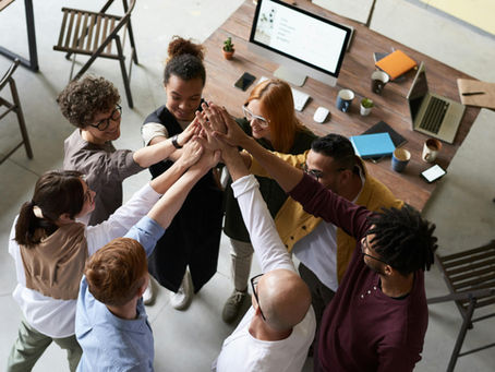 group of people cheering