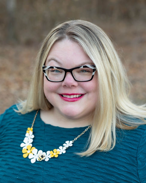 Professional headshot taken at New Joy Photography studio in Gilmer, Texas.