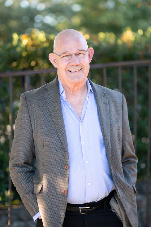 Professional headshot taken at New Joy Photography studio in Gilmer, Texas.