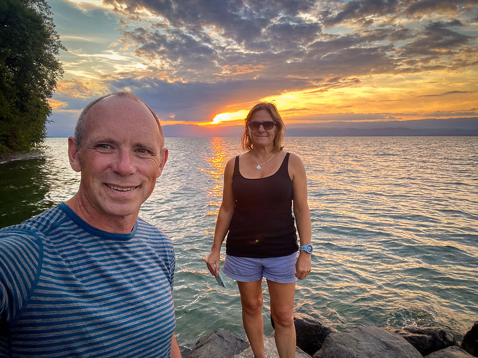 Couple selfie at lakeside sunset