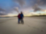 Couple selfie on winter Hebrides beach