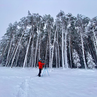 Man infront of Winter snowy forest