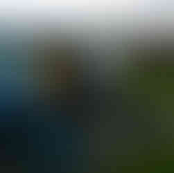 man sitting infront of VW camper