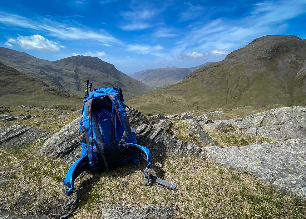 backpack in front of landscape photo