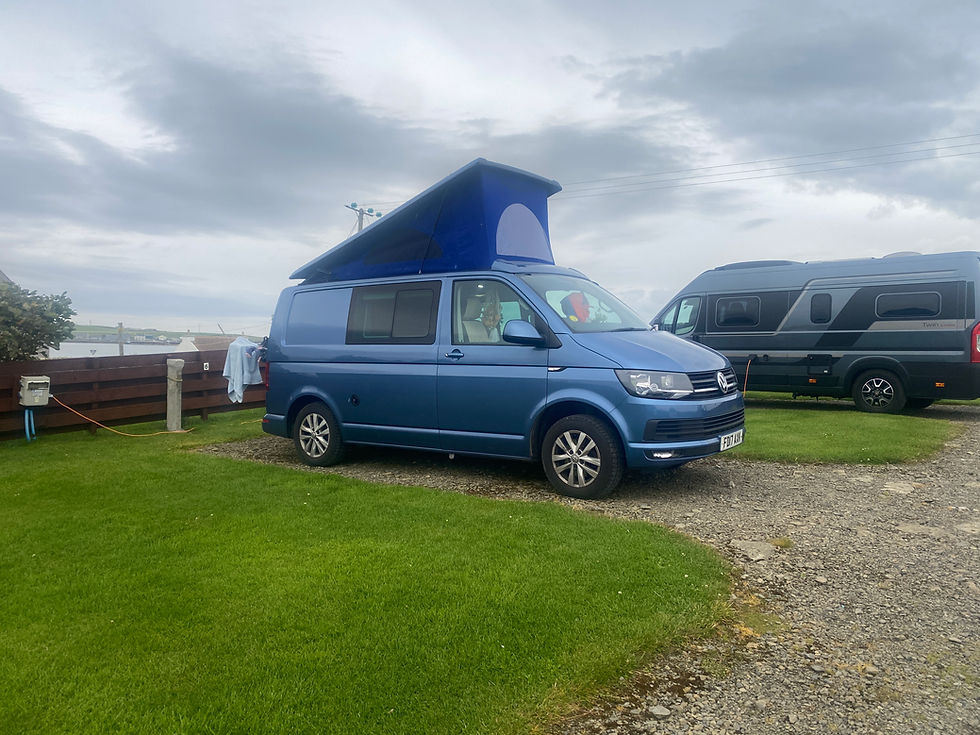 VW campervan on a campsite