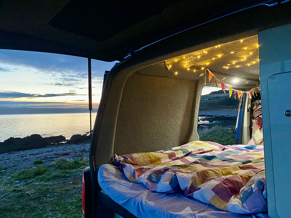 Campervan bedding and fairy lights