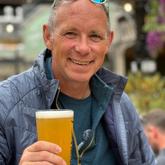 man drinking a pint
