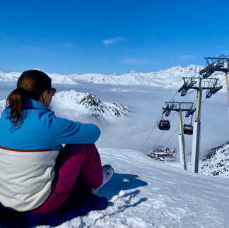 Woman sat looking over to Mont Blanc