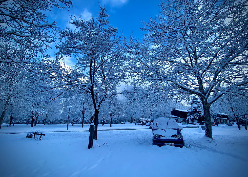 vw campervan on a snowy campsite
