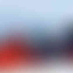 2 men sat in a cafe in the snow