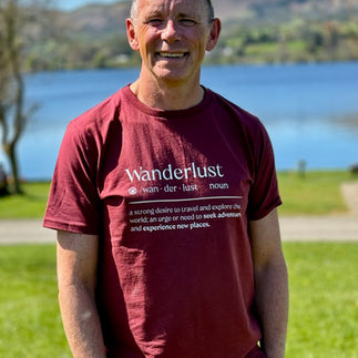 waterside farm campsite man by the lake