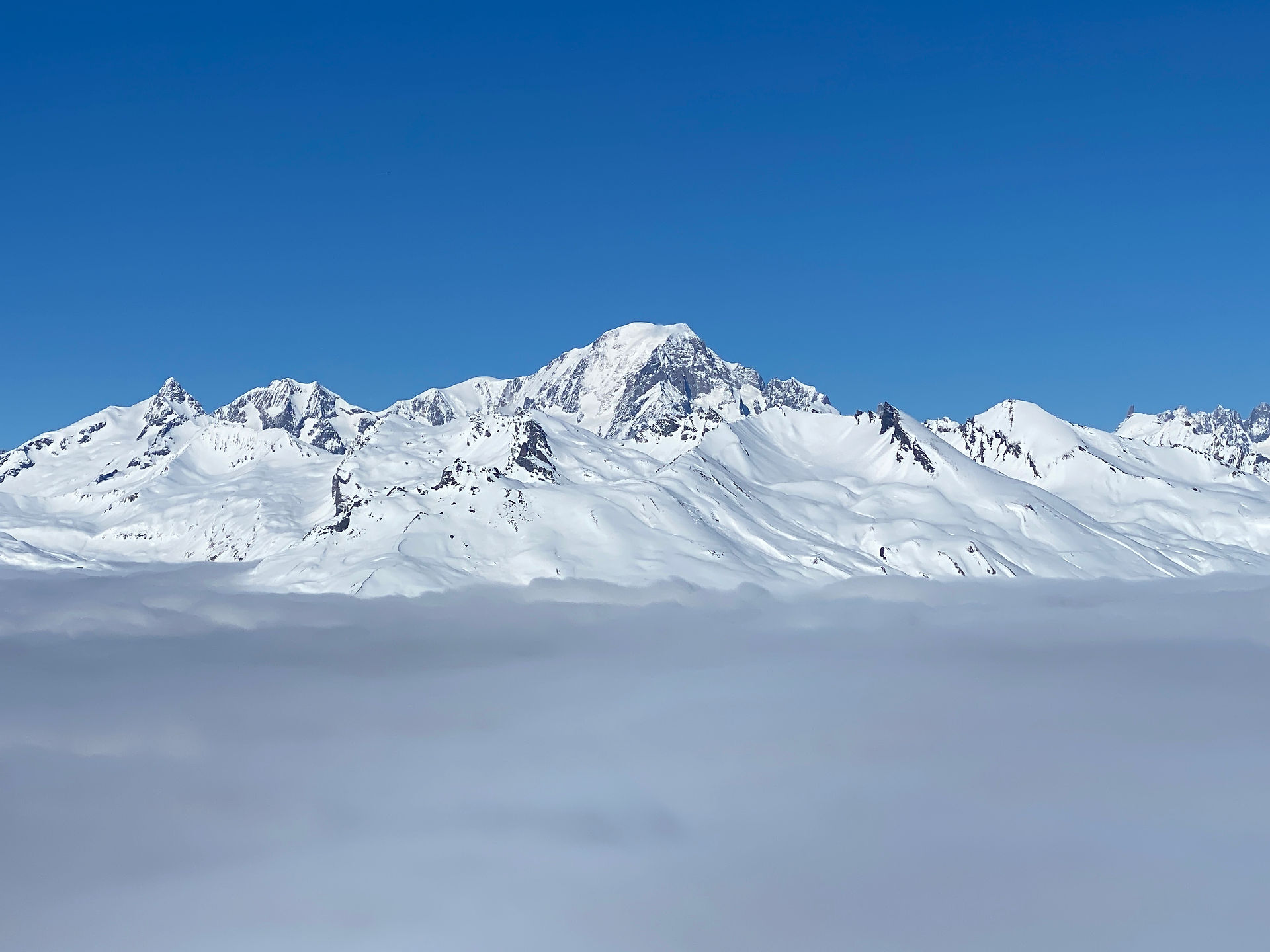Mont blanc sitting above a cloud inversion 
