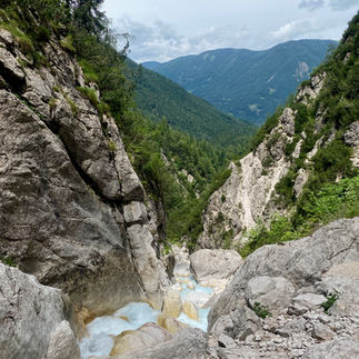 View down the valley from a waterfall