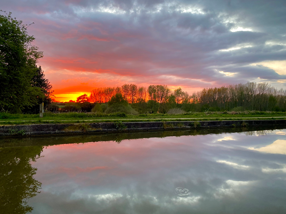 On fire sunset over water