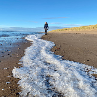 Frozen sea on beach