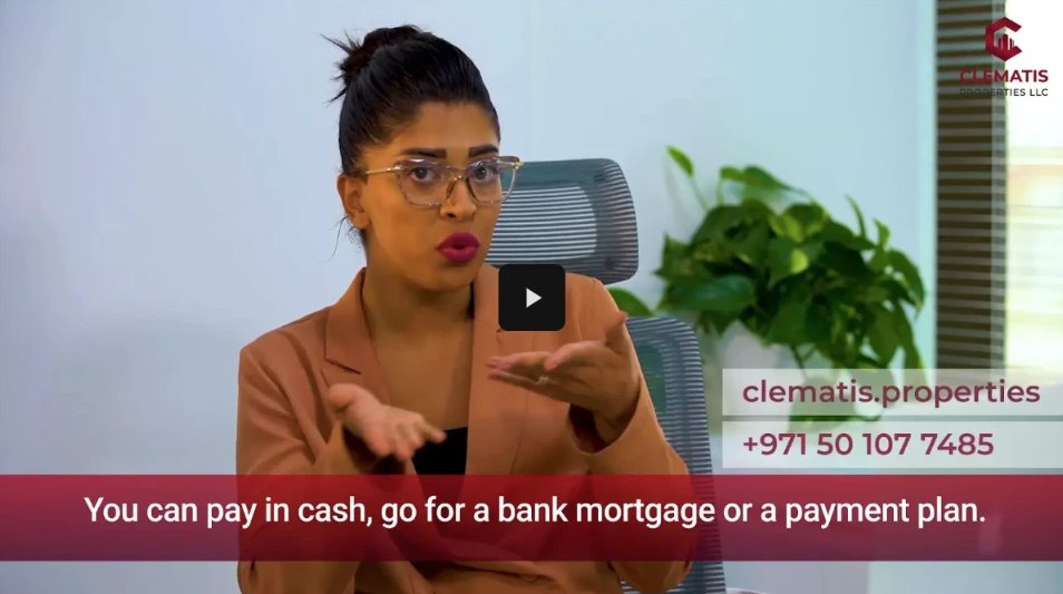 Presenter explaining payment options in an office