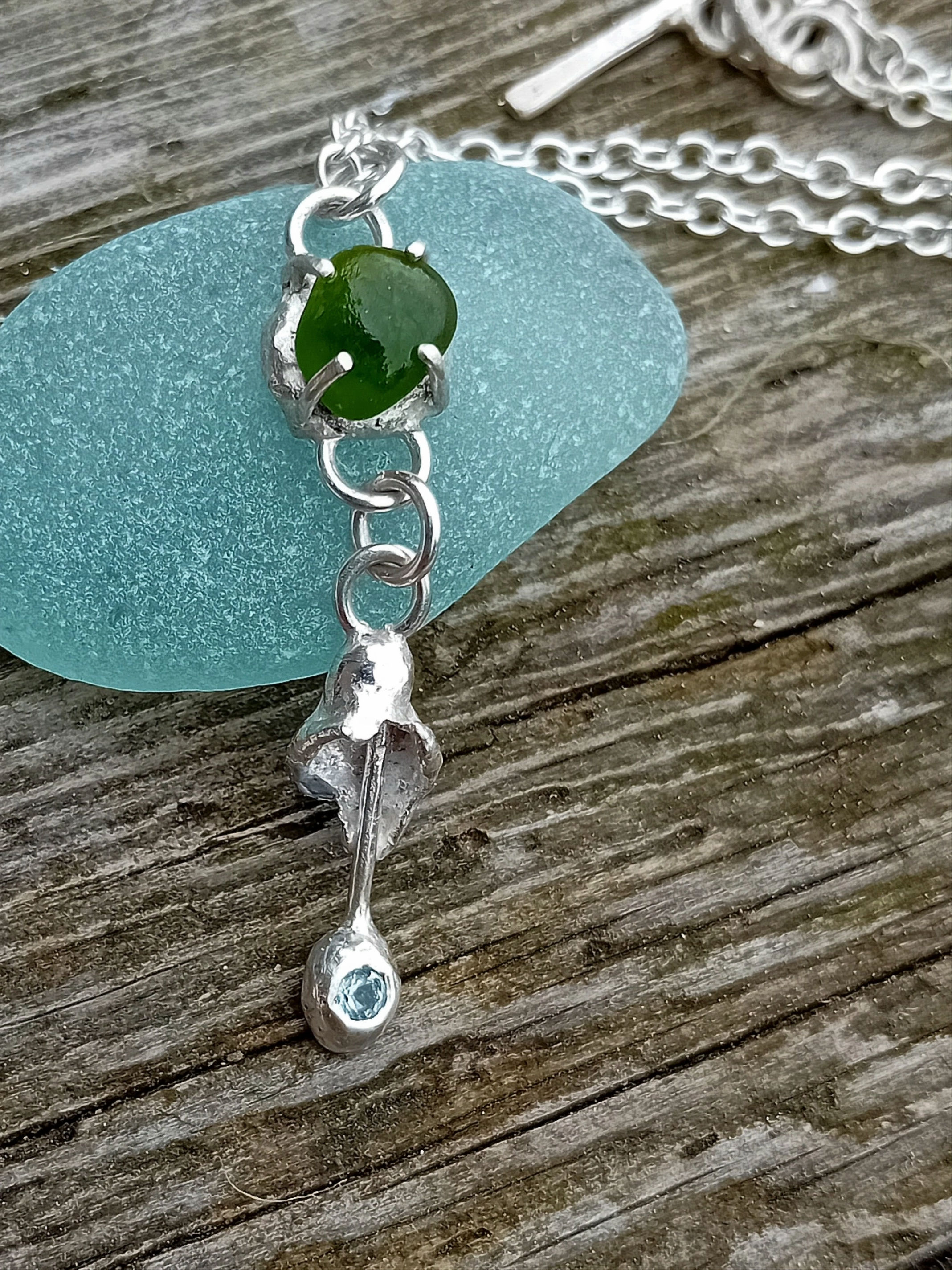 Sea glass and topaz pendant