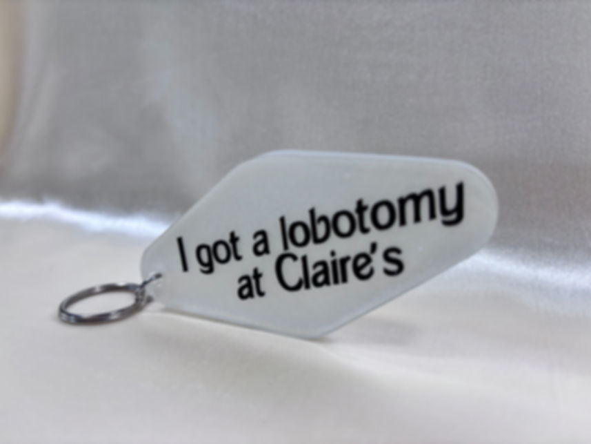 I got a lobotomy at Claire's keychain