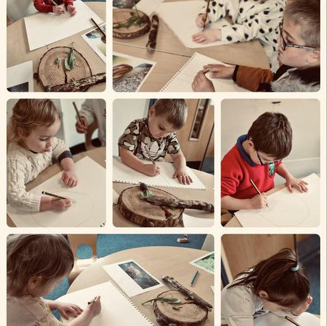 Children drawing with pencils and nature items