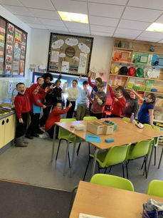 Excited Sofrydd Primary students celebrating a win