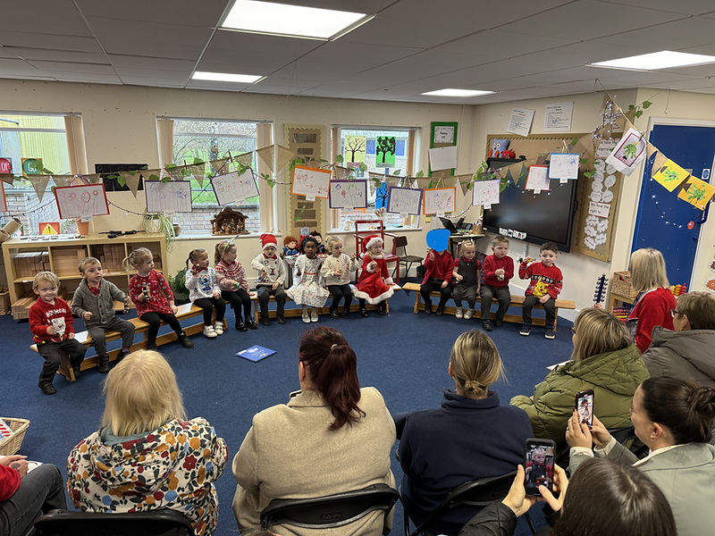 What a lovely Christmas morning we had in Nursery with Parents and Grandparents! The children sang Christmas songs, used musical instruments and danced. Everyone then enjoyed Christmas activities and delicious refreshments! Â