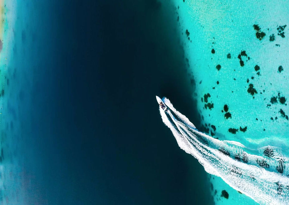 top-view-of-the-blue-bay-lagoon-of-mauritius-a-bo-2021-12-09-22-00-50-utc-1024x1536_edited