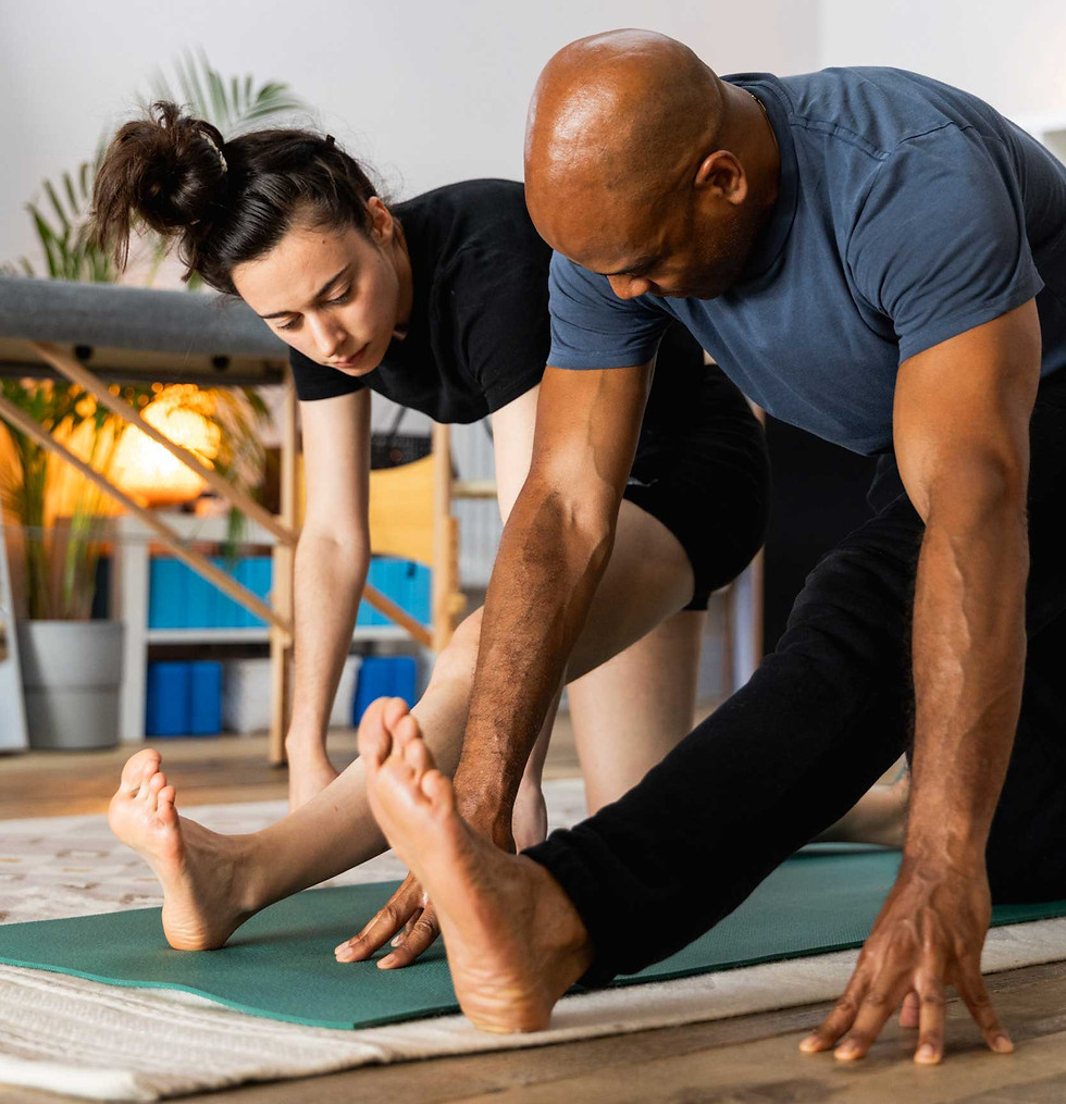 A client performing rehabilitation and mobility exercises guided by a sports therapist.