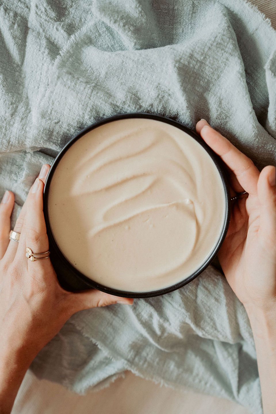  beautifully textured bowl of homemade hummus, ready to be served.