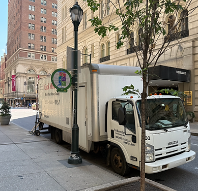 Professsional movers loading furniture during a residential move in Haverford, PA