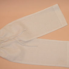 flat lay of white linen pants