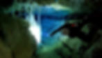 Cave diver in Tulum using powerful primary light.