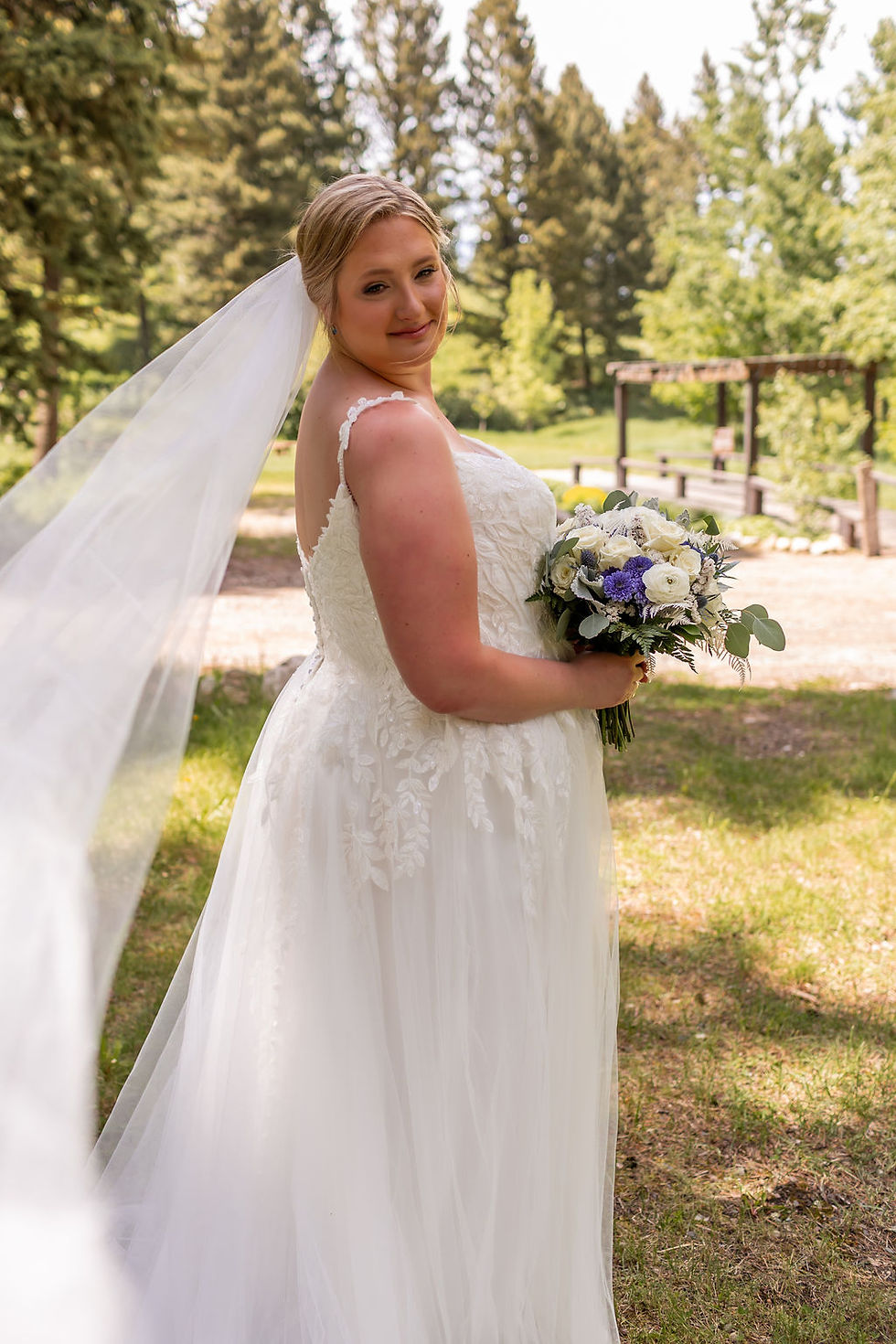Wedding planner Alana Wangen with bride during a Montana wedding ceremony.