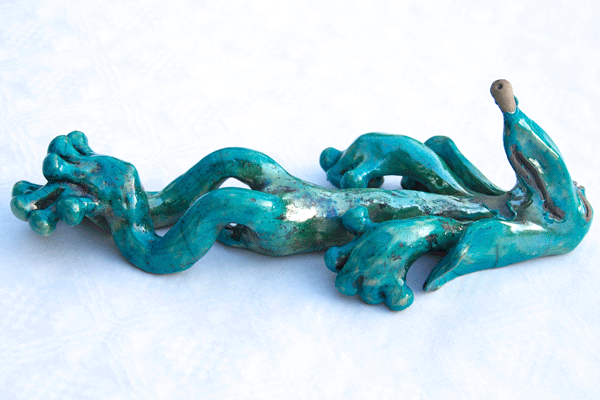 ceramic relaxed dog pottery 03.gif