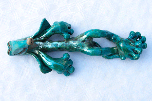 ceramic relaxed dog pottery 01.gif