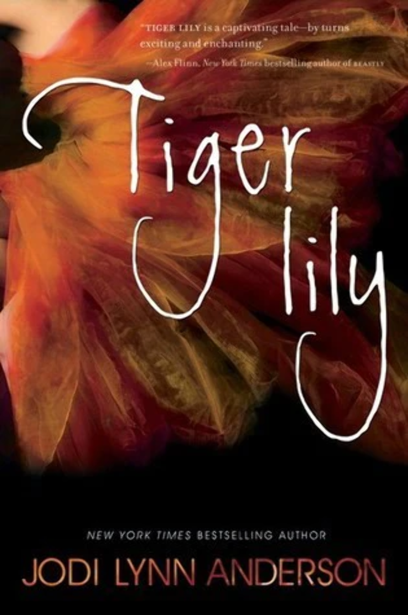 Book cover for "Tiger Lily" by Jodi Lynn Anderson showcases a close-up of a person wearing a voluminous, layered dress in vibrant shades of orange, red, and yellow that mimic flower petals. The title is written across the bottom in a thin, elegant gold font decorated with subtle, curved lines and small white dots.
