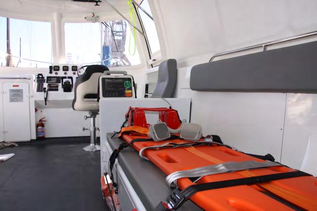 Stretcher and treatment area inside the water ambulance cabin