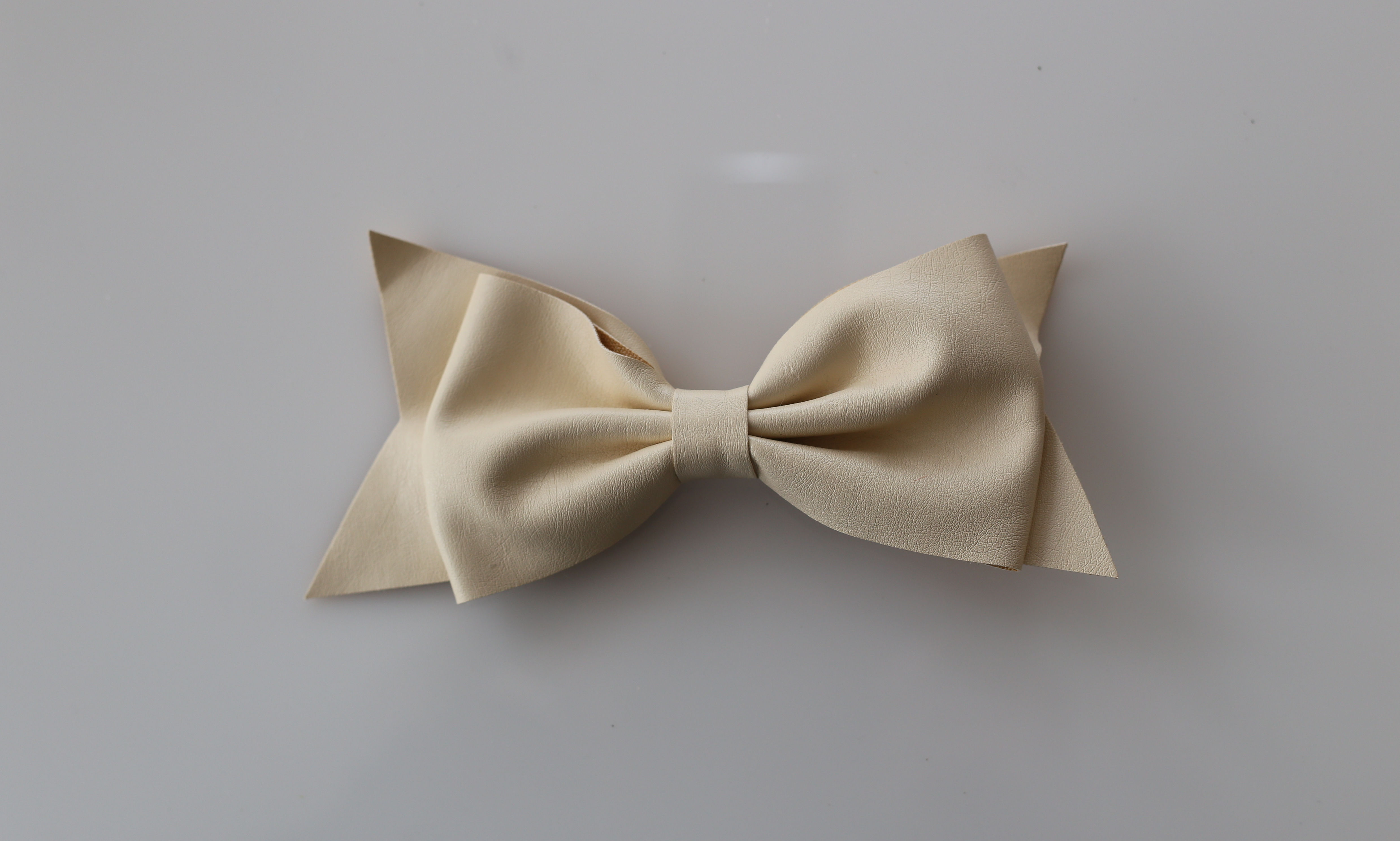 Leatherette Bow With Integral Clip
