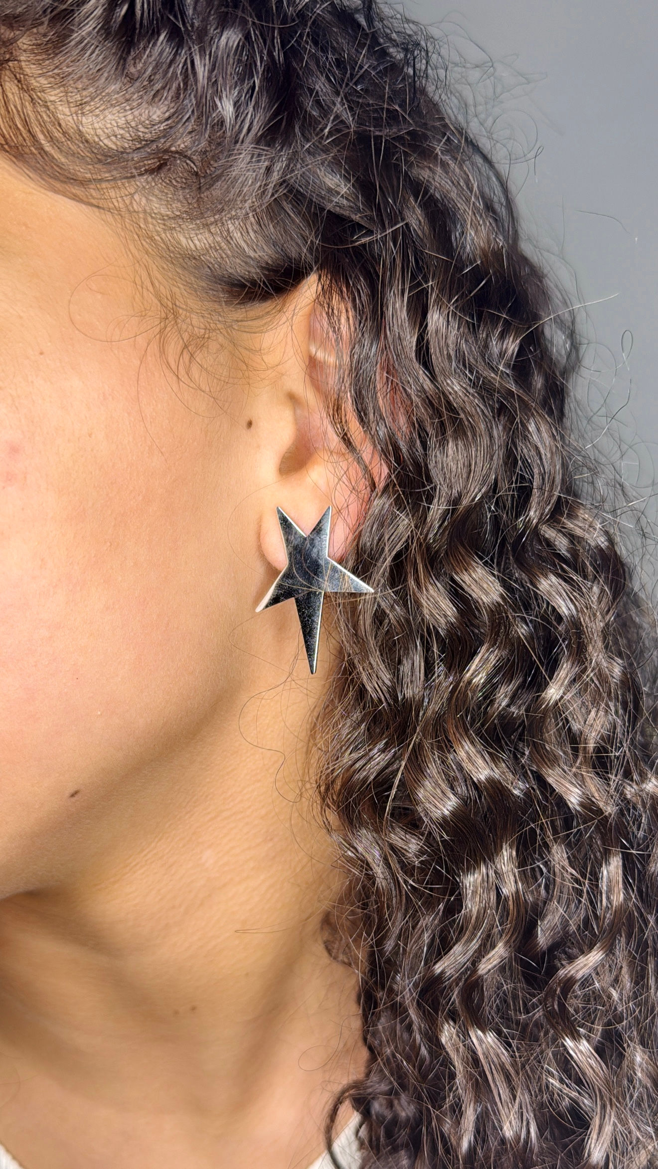Pendientes estrella plateado 