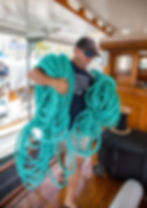 Film crew getting ropes ready for movie shoot for the white lotus on the vida mia