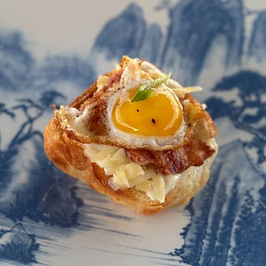 Artisinal bacon egg and cheese Pastry on the vida mia